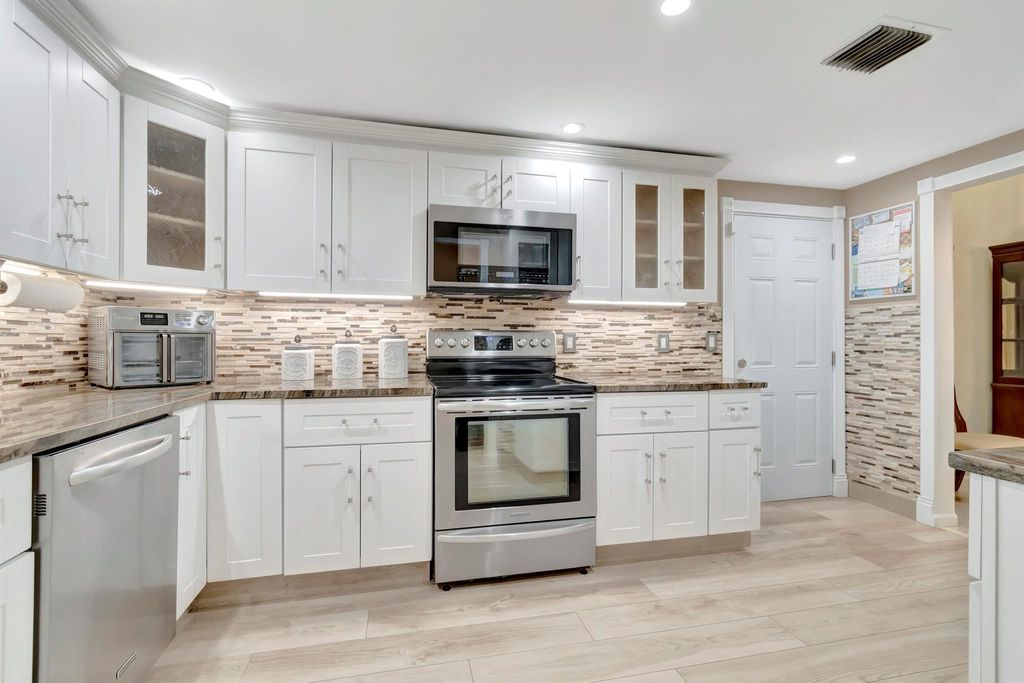 Photo of 4437 Rende Lane, Lake Worth, FL 33461 (MLS # R10924111)