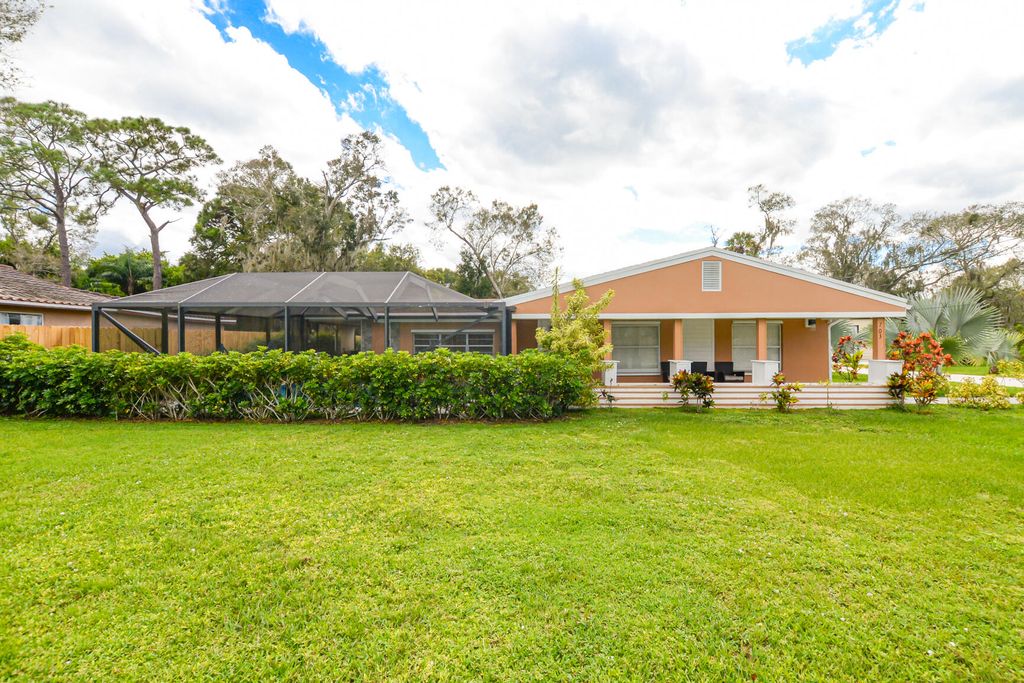 Photo of 703 Ulrich Road, Fort Pierce, FL 34982 (MLS # R11023298)