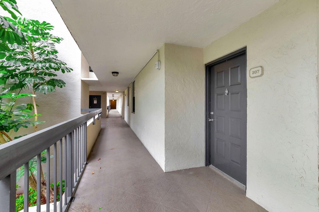 Photo of 2025 Lavers Circle #D 207, Delray Beach, FL 33444 (MLS # R10973607)