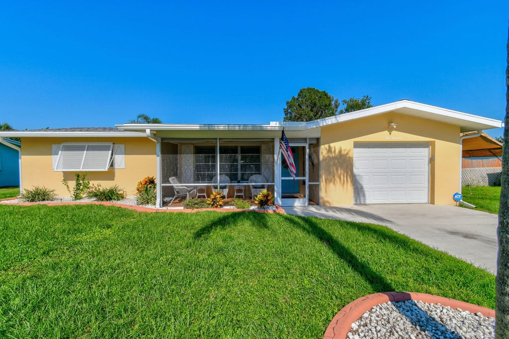 Photo of 114 E Aldea Street, Port Saint Lucie, FL 34952 (MLS # R11028920)