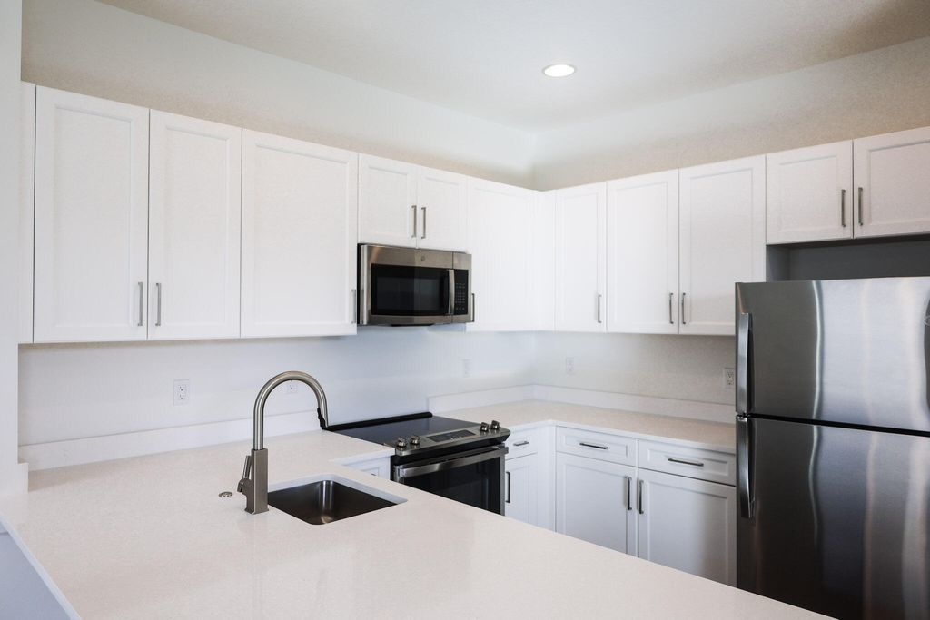 Photo of 1006 Faulkner Terrace, Palm Beach Gardens, FL 33418 (MLS # R11041396)