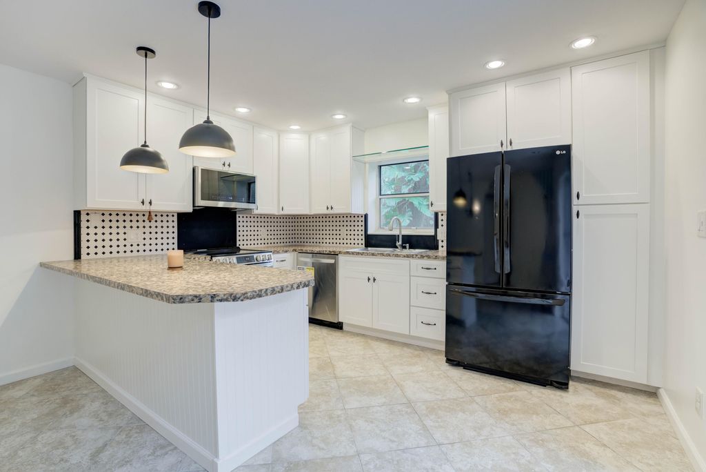Photo of 105 SE Beech Tree Lane, Stuart, FL 34994 (MLS # R10937641)