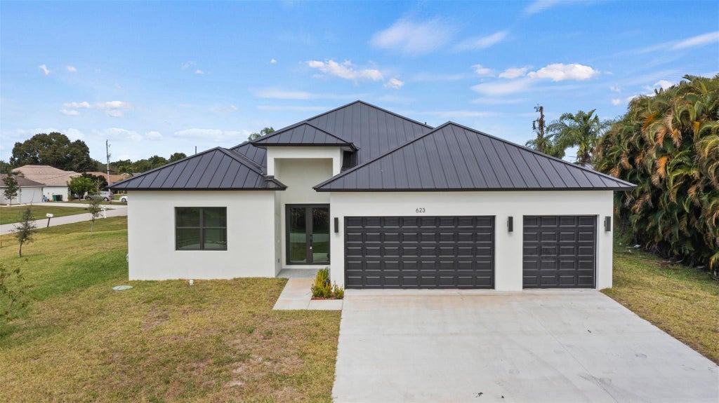 Photo of 623 SE Dean Terrace, Port Saint Lucie, FL 34984 (MLS # F10539084)