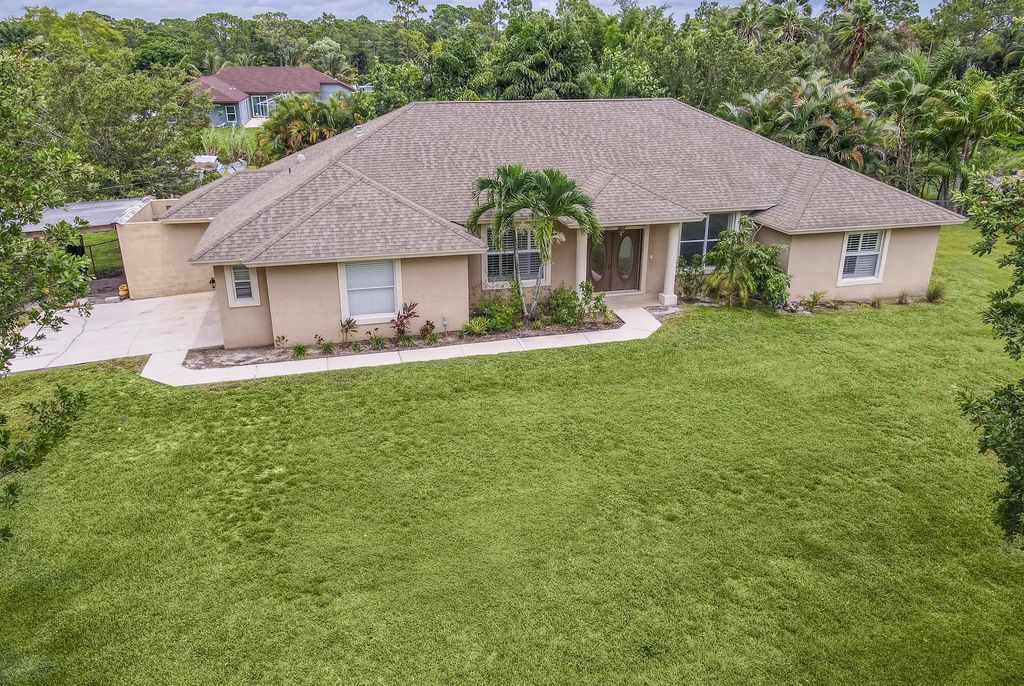 Photo of 15213 N 93rd Street, The Acreage, FL 33412 (MLS # R11100753)