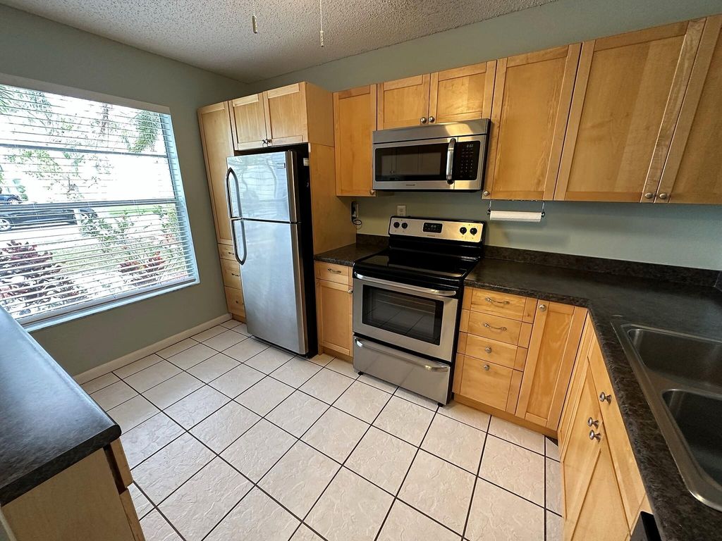 Photo of 149 Deerfield Drive, Jupiter, FL 33458 (MLS # R11067071)