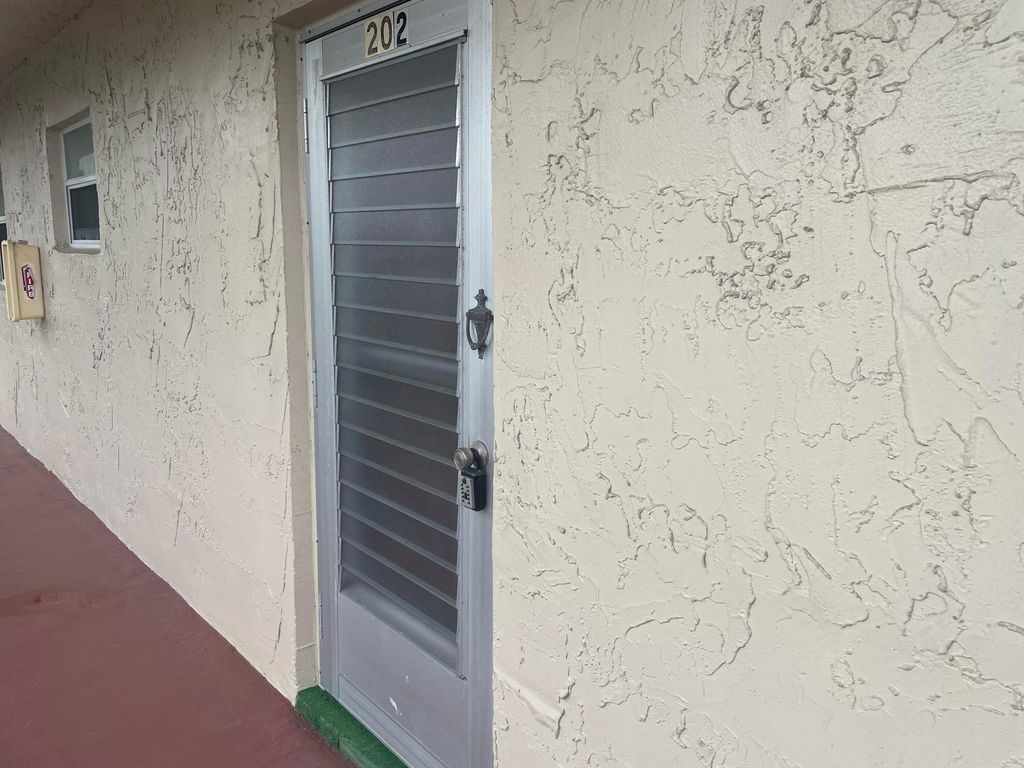 Photo of 701 Lori Drive #202, Palm Springs, FL 33461 (MLS # R11135448)