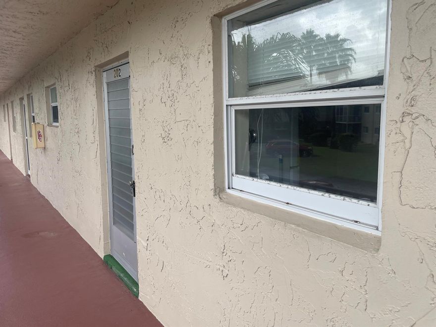 Seller is foreign and buyer must sign FIRPTA at closing. Condo has tile throughout and views of Bocci court. Lakeside Village offers much to do. Mini golf, 2 clubhouses, picnic and BBQ area and of course 2 swimming pools plus gym. Near beaches, airport and short drive to downtown area. Sorry no leasing first 2 years of ownership.