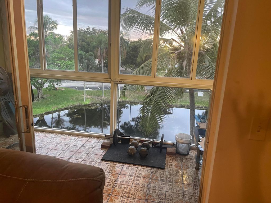 Photo of 1101 NW 58th Terrace #404, Sunrise, FL 33313 (MLS # B26008710)