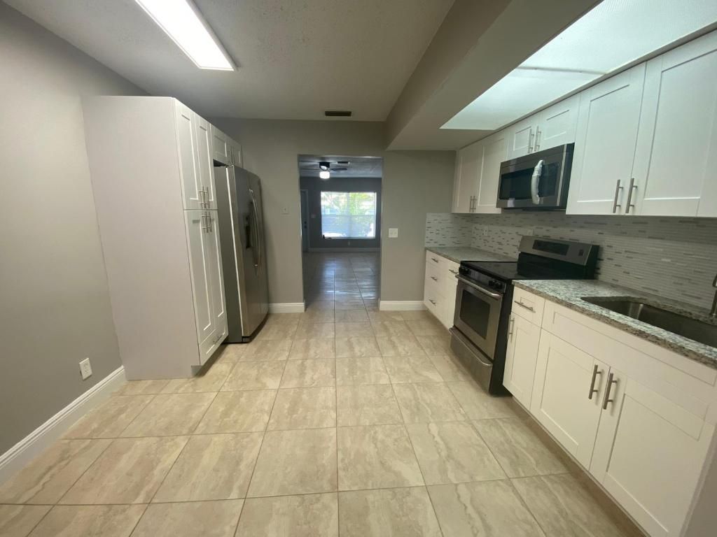 Photo of 182 SE 10th Street, Deerfield Beach, FL 33441 (MLS # R11152520)