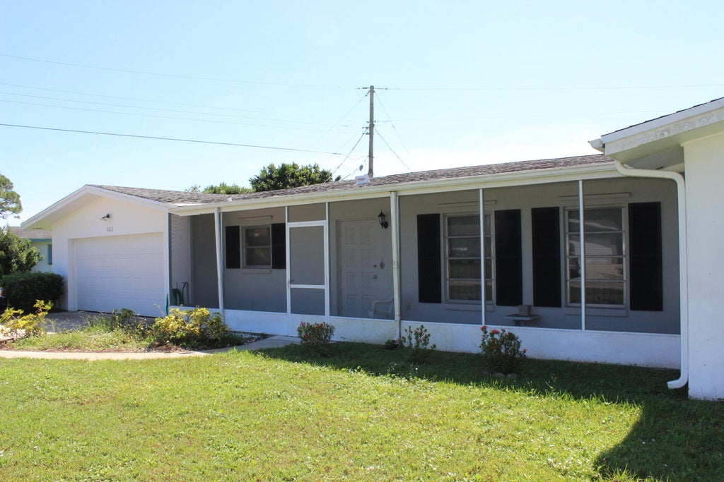 Photo of 602 Beach Avenue, Port Saint Lucie, FL 34952 (MLS # R10943939)