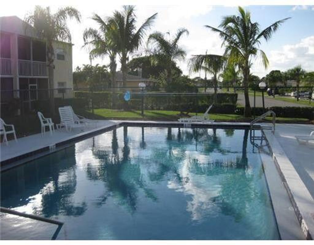 Photo of 1505 Crescent Circle #B27, Lake Park, FL 33403 (MLS # R11155673)