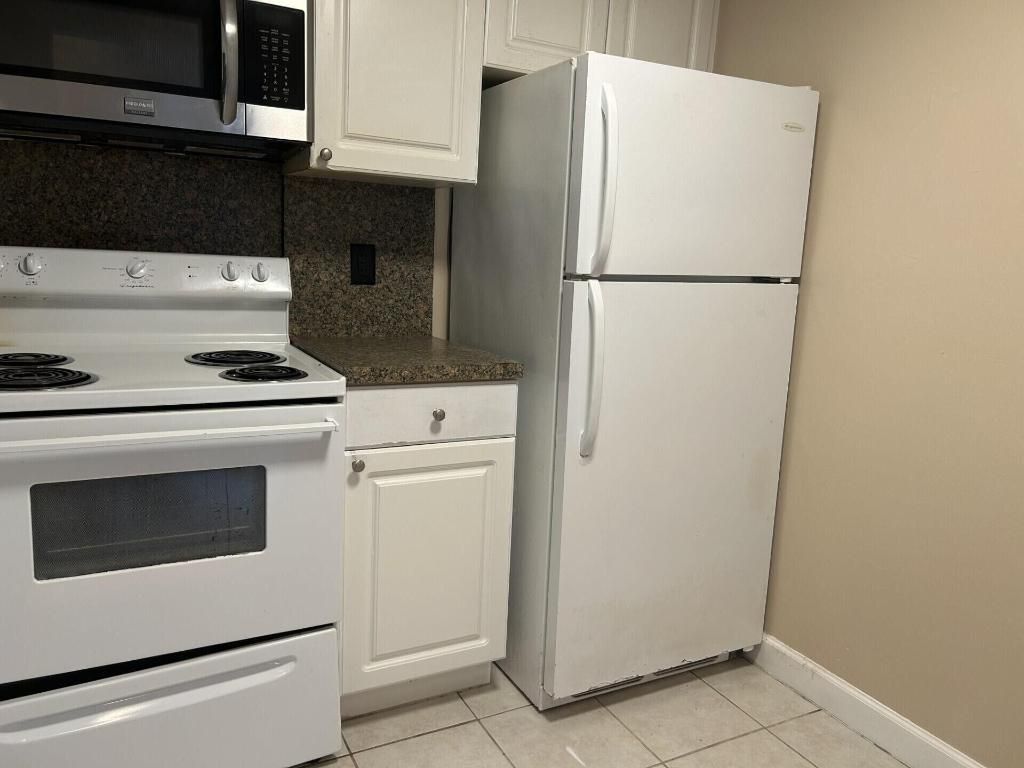 Photo of 1505 Crescent Circle #B27, Lake Park, FL 33403 (MLS # R11155673)