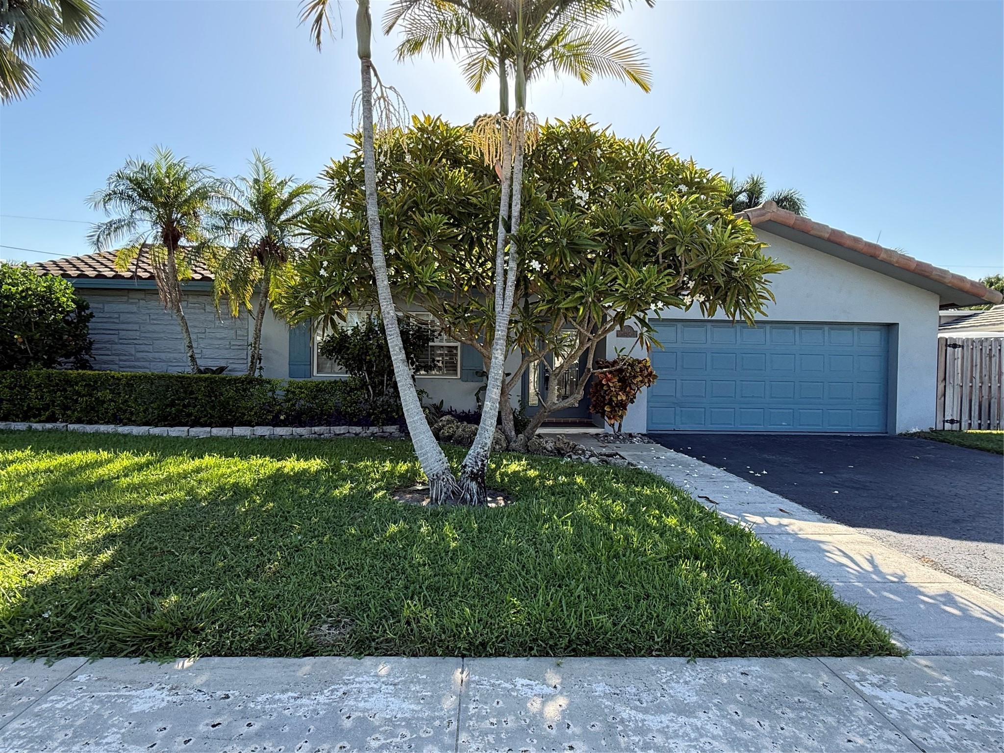 Rent this well maintained single 4 bedroom and 2 bathrooms home in a residential area in Boca Raton. Enjoy this remodeled home with wood floorings, tile Living Room and wet areas, walk-in closet in the master room. Stain Steel Appliances. Enjoy the screened and Salt water pool, Jandy light system and water heater installed on 2023, covered patio, safety with childs fence. Outdoor hot/cold shower. Take advantage of this home with an extra panel for a generator. Very convenient home close to schools, shopings, main roads, restaurants and parks