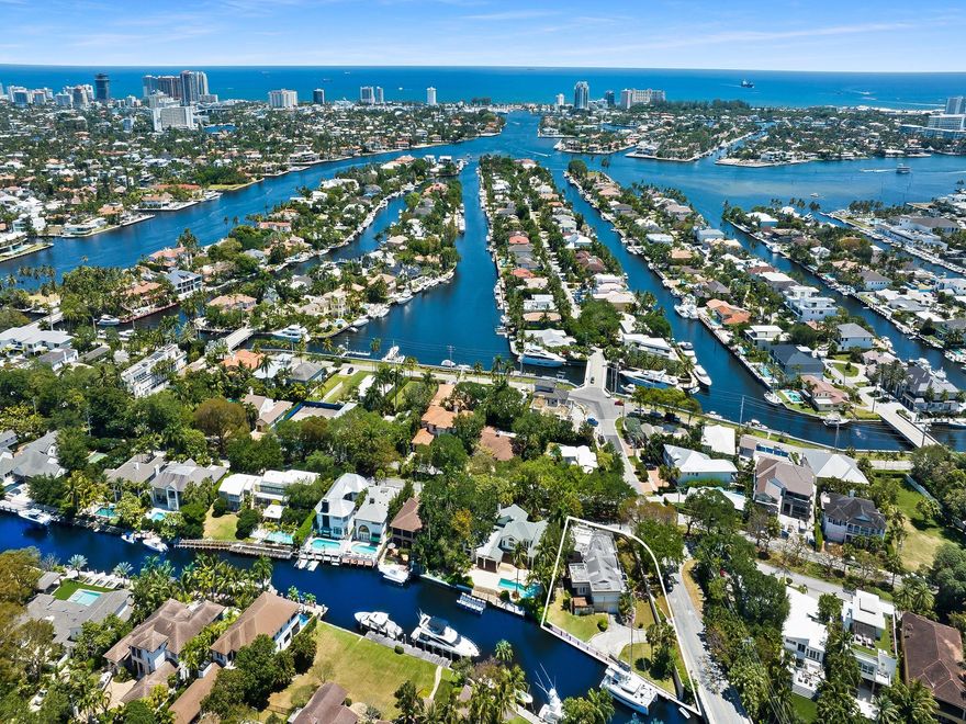 150+ FEET OF PROTECTED DOCKAGE ON THE TARPON RIVER!  HISTORIC RIO VISTA!  HUGE 1/2 ACRE LOT!  TEAR DOWN READY FOR REDEVELOPMENT!  VERY HIGH ELEVATION AT THE TOP OF THE CORAL RIDGE ALLOW FOR 4 STORY HOUSE!  UNLIMITED POSSIBILITIES TO DEVELOP WITH A BIG CHUNK OF LAND IN THE MOST DESIRABLE FAMILY NEIGHBORHOOD!  LESS THAN A 5 MINUTES GOLF CART RIDE TO DOWNTOWN AND 17TH STREET CAUSEWAY!  COME TOUR YOUR FUTURE ESTATE COMPOUND TODAY!