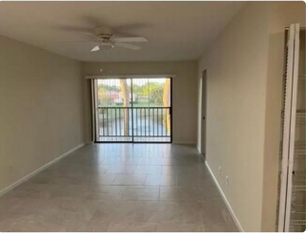 Photo of 2083 NE Collins Circle #860, Jensen Beach, FL 34957 (MLS # R10970730)