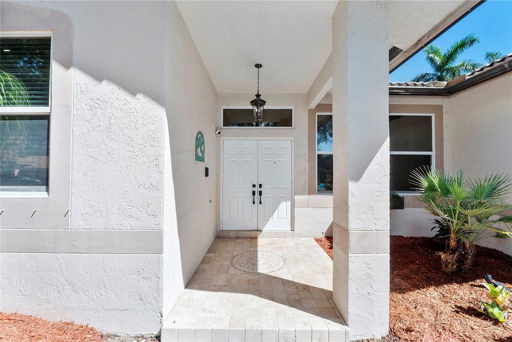 Photo of 4511 NW 49th Ct, Coconut Creek, FL 33073 (MLS # F10526140)