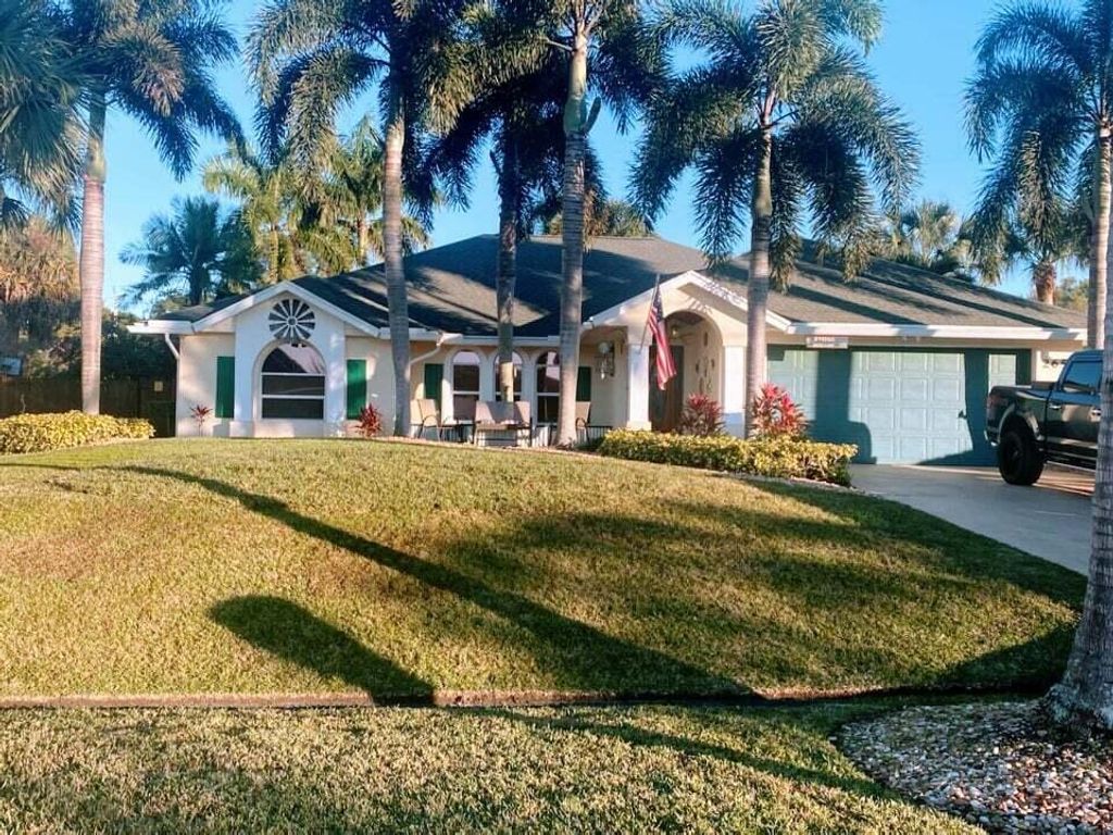 Photo of 2654 SW Acco Road Rd, Port St Lucie, FL 34953 (MLS # R10773783)