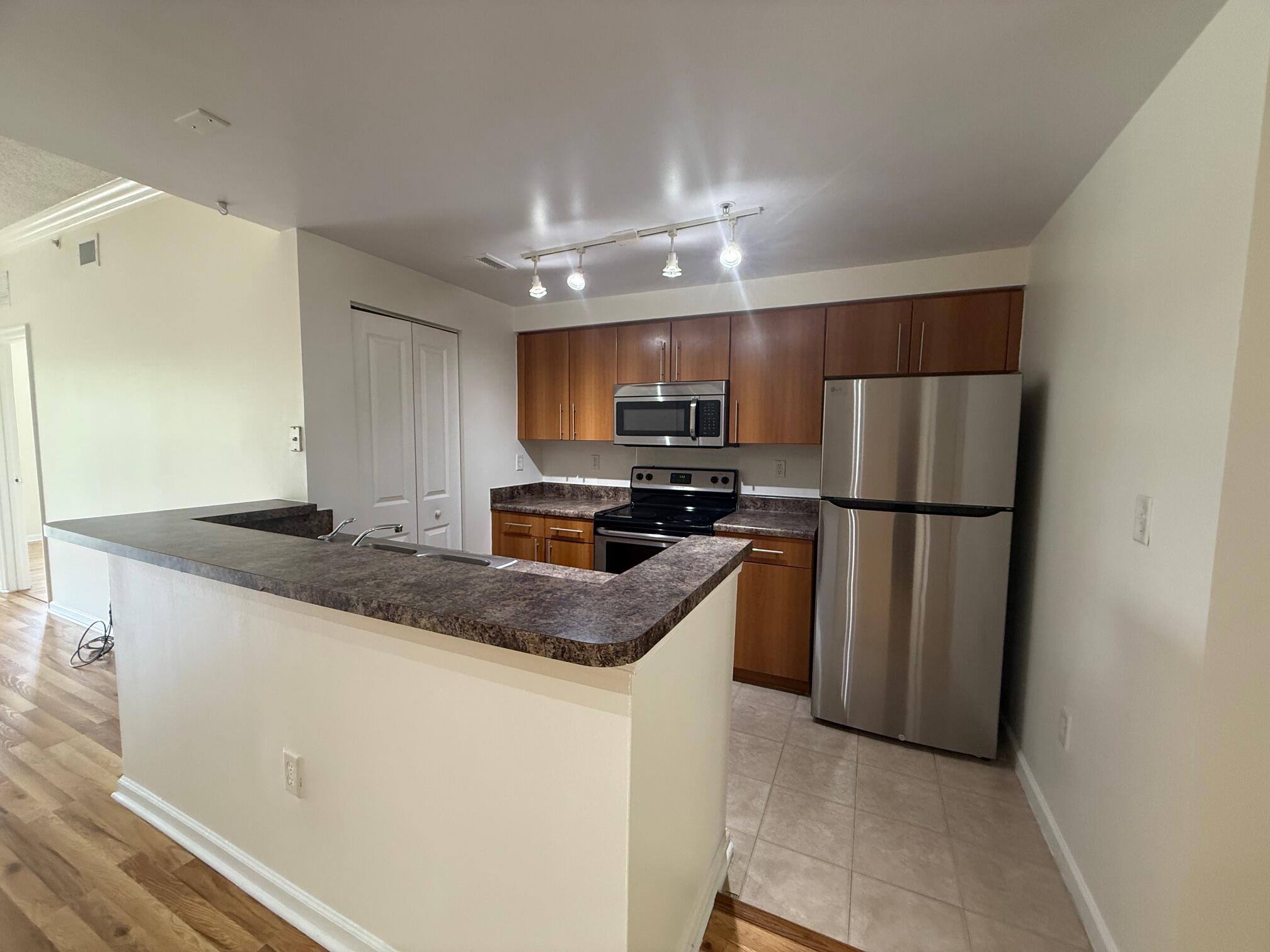 EL-AD POINCIANA CONDO - Residential Lease