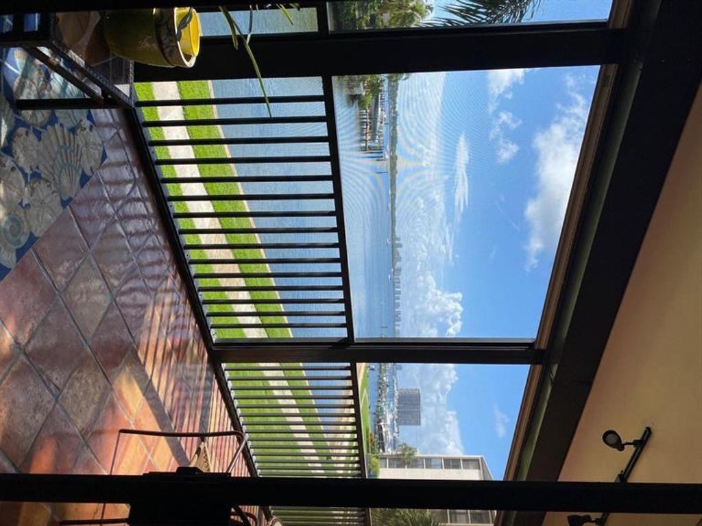 Photo of 11370 Twelve Oaks Way #211, North Palm Beach, FL 33408 (MLS # R10727581)