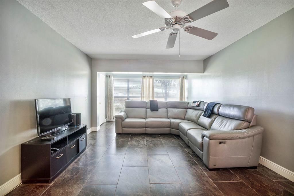 Photo of 2411 Papaya Drive #203, Delray Beach, FL 33445 (MLS # R10660442)