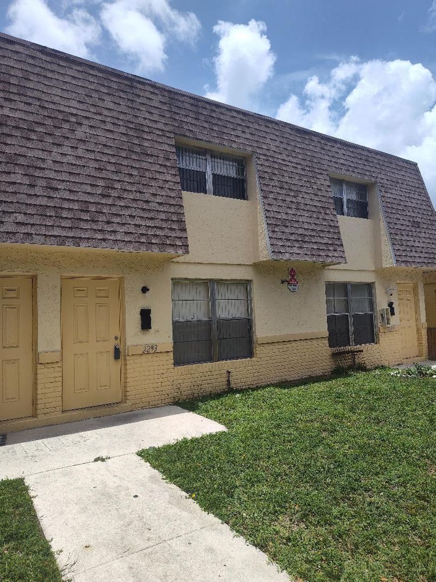 Beautiful townhouse for rent in the heart of Lauderhill. The property is move in ready. Rent is only $2000 a month. You can move in right away. No minimum credit score required. Just make sure there is no eviction and decent background. You can move into this property in 24 to 48 hours. Water is included in the rent. You just have to pay for your light. The property has a small backyard for you to enjoy. There is a beautiful lake behind the house. The view is amazing. The property comes with 2 assigned parking spots. There is also washer and dryer hookup at the property. There is no Association process to go through. Only owner approval is required. Do not delay. Lease this property today