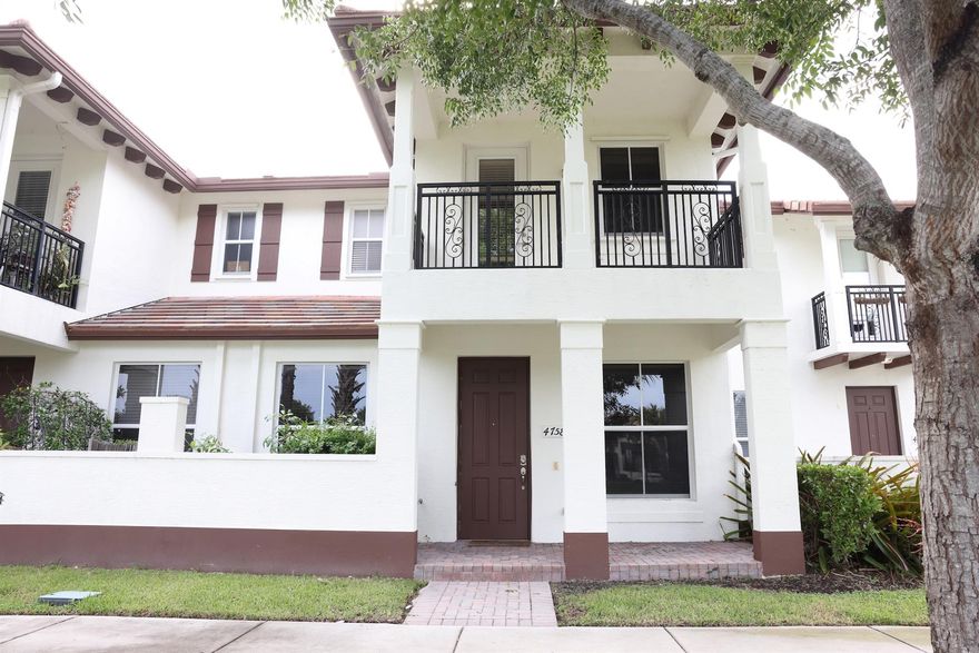 Beautifully Maintained & Move-In Ready! This 3 bed, 2.5 bath townhome offers 1,841 sq ft of living space plus a 2-car garage. The first floor features an open porch with lake views, while the interior boasts an open family/dining area and upgraded kitchen with wood cabinets & granite. The front entry is set along a quiet walkway (no direct street traffic), adding privacy and charm. Upstairs, the primary suite has 2 walk-in closets, a private balcony with lake views, and a convenient 2nd-floor laundry that adds comfort and practicality. Paloma Lakes is a gated, well-kept community near The Promenade at Coconut Creek. Open-air shopping and dining destination with shops, restaurants, and cinema. This community is beautifully maintained and centrally located in the heart of Coconut Creek.