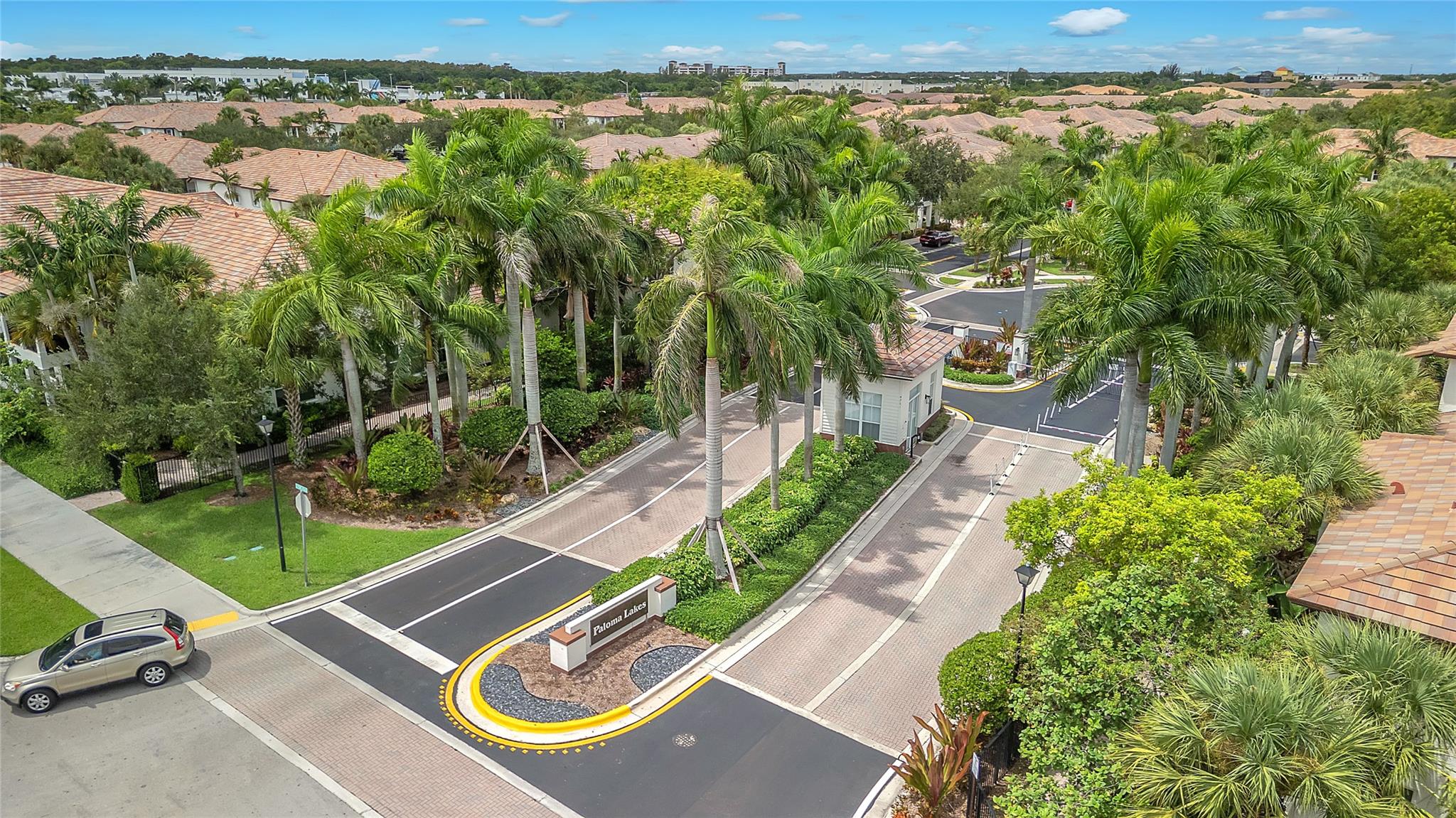 Beautifully Maintained & Move-In Ready! This 3 bed, 2.5 bath townhome offers 1,841 sq ft of living space plus a 2-car garage. The first floor features an open porch with lake views, while the interior boasts an open family/dining area and upgraded kitchen with wood cabinets & granite. The front entry is set along a quiet walkway (no direct street traffic), adding privacy and charm. Upstairs, the primary suite has 2 walk-in closets, a private balcony with lake views, and a convenient 2nd-floor laundry that adds comfort and practicality. Paloma Lakes is a gated, well-kept community near The Promenade at Coconut Creek. Open-air shopping and dining destination with shops, restaurants, and cinema. This community is beautifully maintained and centrally located in the heart of Coconut Creek.