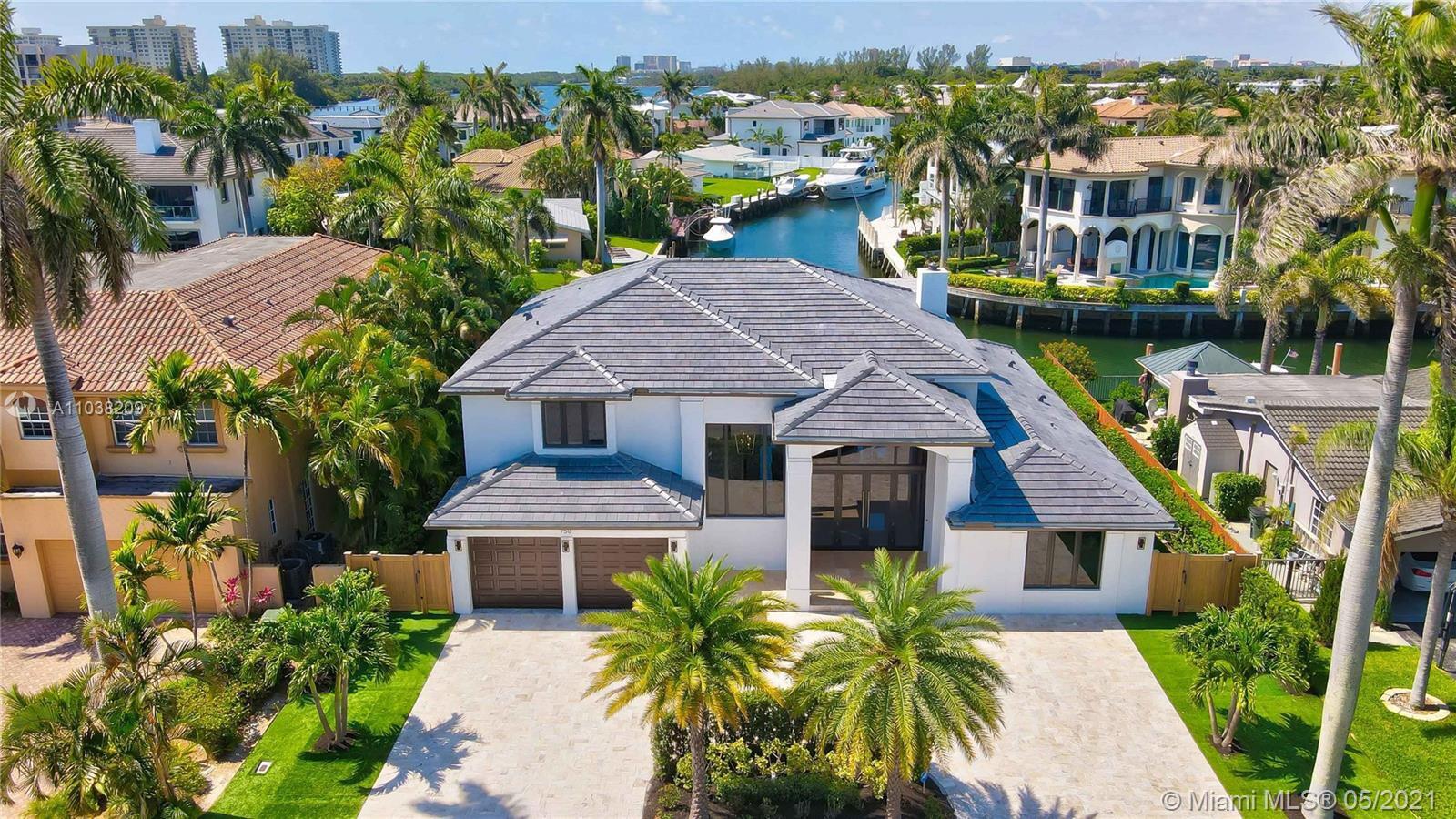 Fabulous furnished contemporary waterfront residence, available for seasonal or annual lease October 2025. Southern exposure over intersecting waterfront canals, Boat dockage right off Intracoastal & close to inlet. Private pool and spa, impact glass, volume ceilings, chef's kitchen, glass wine cellar, fabulous views, spacious living and dining areas with vistas through floor to ceiling glass, additional full bar and club lounge on lower level. One bedroom / bath suite on the lower level. Large master suite with private den and grand master bathroom upstairs, additional guest bedroom suite upstairs, optional 4th bedrm. A rare, contemporary retreat, designed for both elegance and amusement, that can be your private deepwater oasis in the heart of coveted Boca Raton!