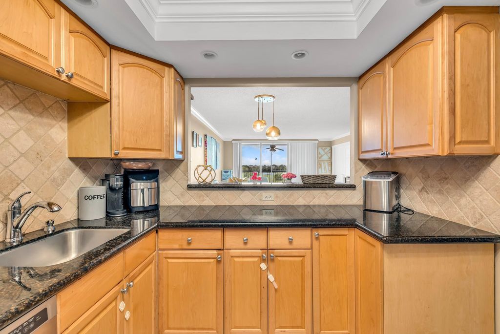 Photo of 3080 N Course Dr #501, Pompano Beach, FL 33069 (MLS # F10533013)
