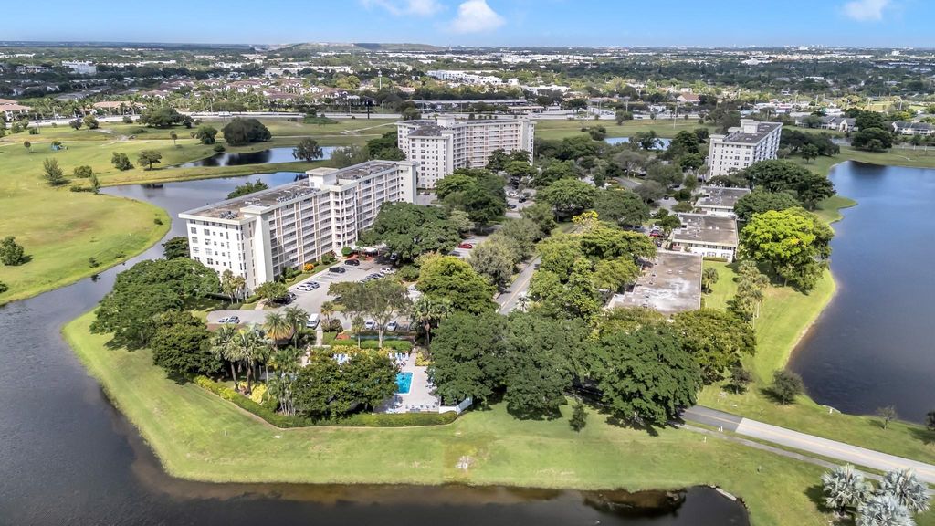 Photo of 3080 N Course Dr #501, Pompano Beach, FL 33069 (MLS # F10533013)