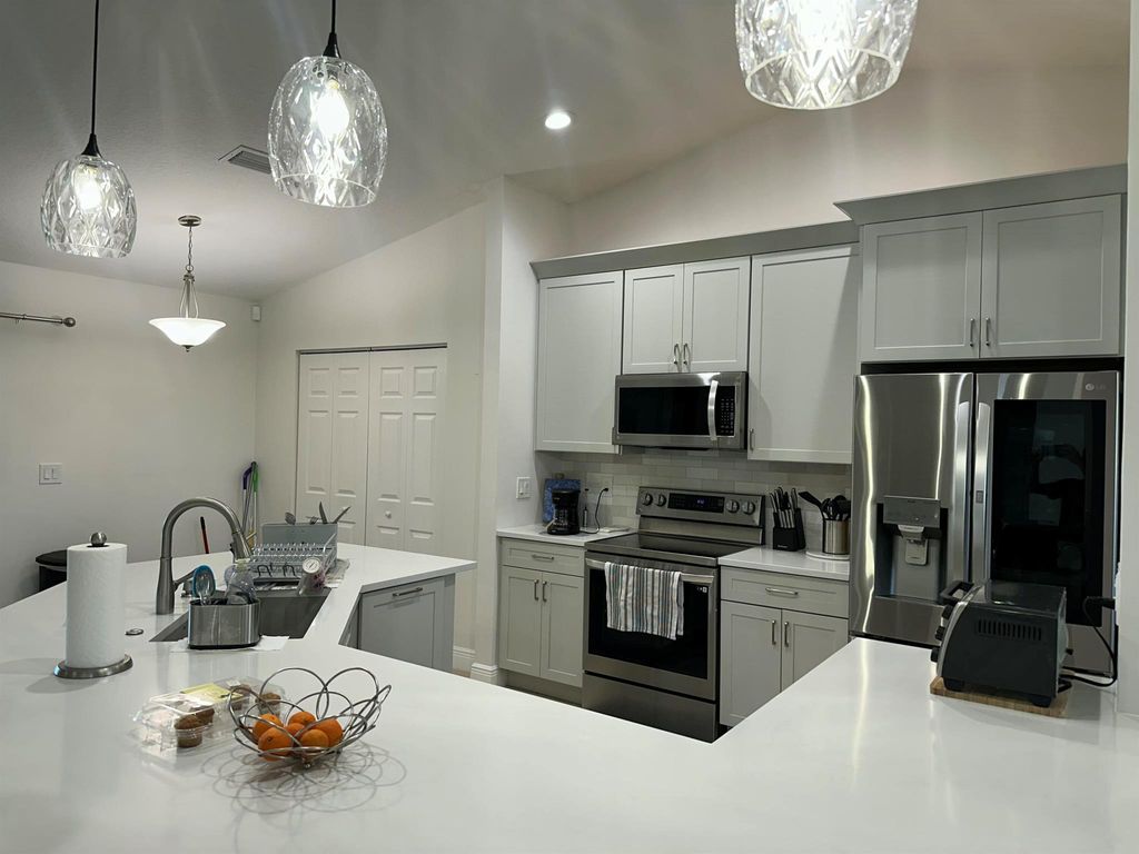 Photo of 3942 SW Jarmer Road, Port Saint Lucie, FL 34953 (MLS # R11111682)