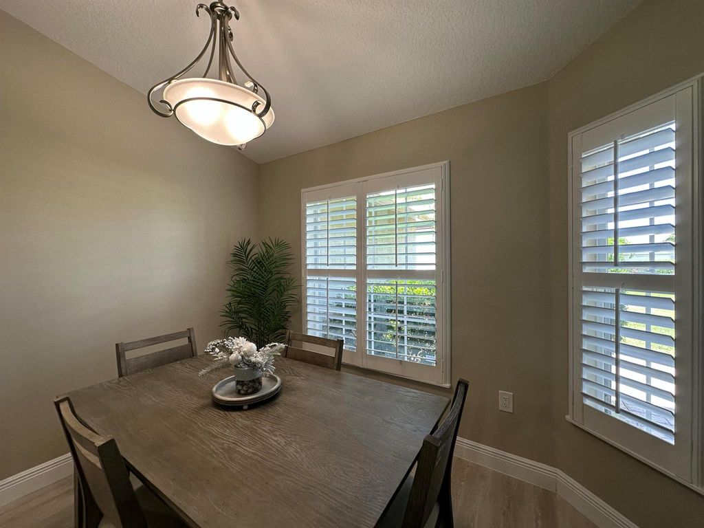 Photo of 3942 SW Jarmer Road, Port Saint Lucie, FL 34953 (MLS # R11111682)