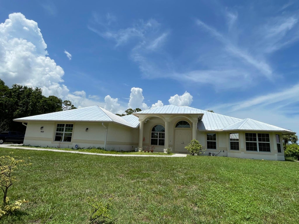 Photo of 12625 88TH Place N, The Acreage, FL 33412 (MLS # B26064925)