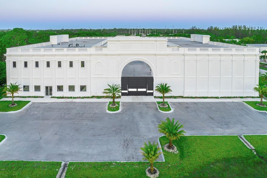 Very upscale Industrial warehouse with 10,000 2nd floor office spaces airconditioned with solid mahogany doors.  All of the bay doors are ground level off a center courtyard. There are 30 + or - parking spaces at the front of the building that sits Just off Pratt Whitney Rd. This is a desirable commercial/mixed-use property with a one-of-a-kind gated archway entry. The expansive courtyard has enormous storage areas, multiple office spaces, versatile showrooms, and a large balcony looking down on an Italian designed open floor area.