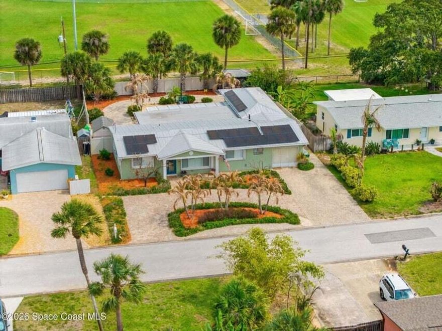 Tucked into the heart of sought-after Indian Harbour Beach, this versatile 4BR/3BA pool home offers the perfect blend of coastal living, accessibility, and investment potential. Featuring two private suites, wide doorways, and a handicap-accessible bathroom, the flexible layout is ideal for multigenerational living, guests, or rental income. Multiple living areas and a spacious kitchen create a warm, inviting flow filled with natural light. Outside, enjoy a resort-style backyard with a fully pavered patio, covered seating area, pergola, pool, and extra storage. Metal roof and fully paid-off solar panels add efficiency and long-term value. Circular driveway, no HOA, beach proximity, and direct access to Algonquin Sports Complex complete this exceptional property.