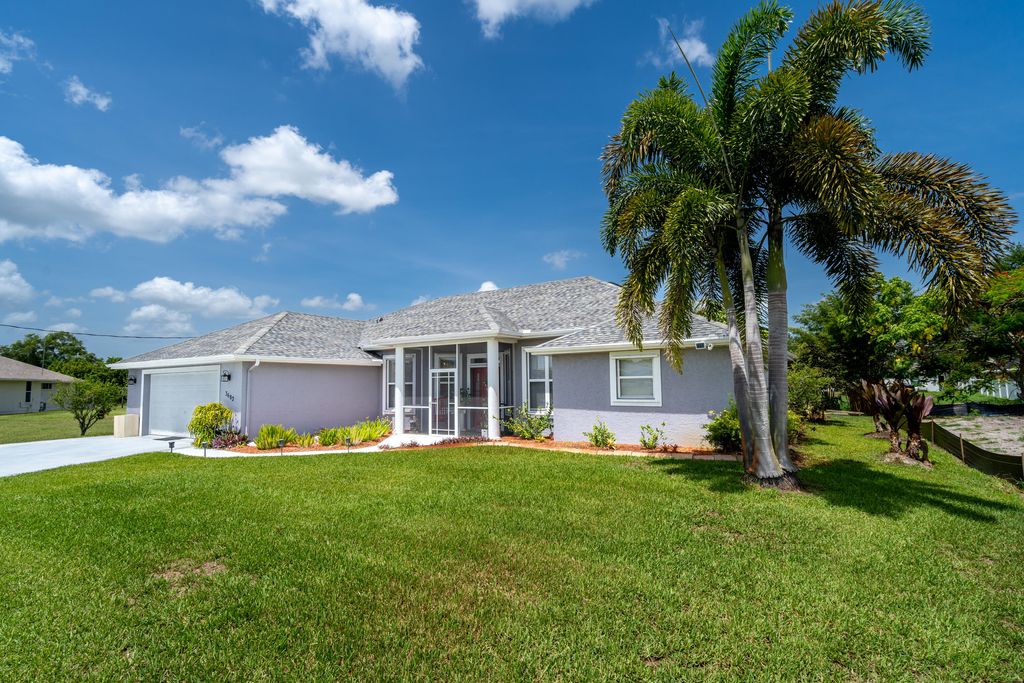 Photo of 3682 SW Rivera Street St, Port St Lucie, FL 34953 (MLS # R10809154)