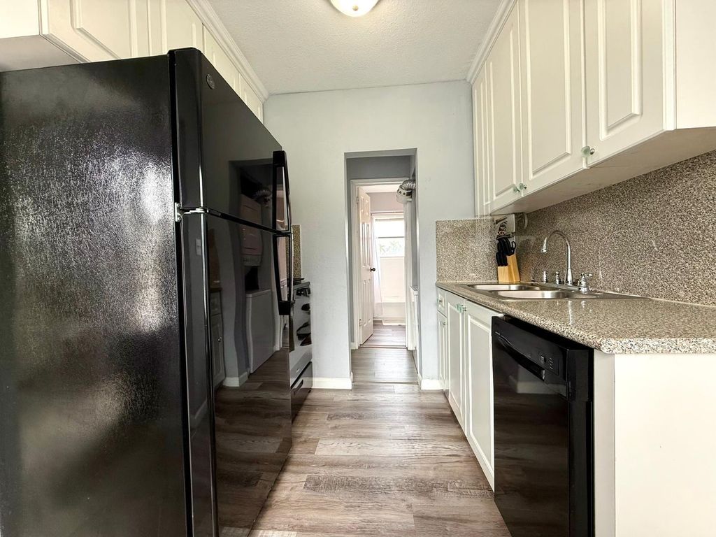 Photo of 3801 S Olive Avenue #Unit 4, West Palm Beach, FL 33405 (MLS # B26012484)