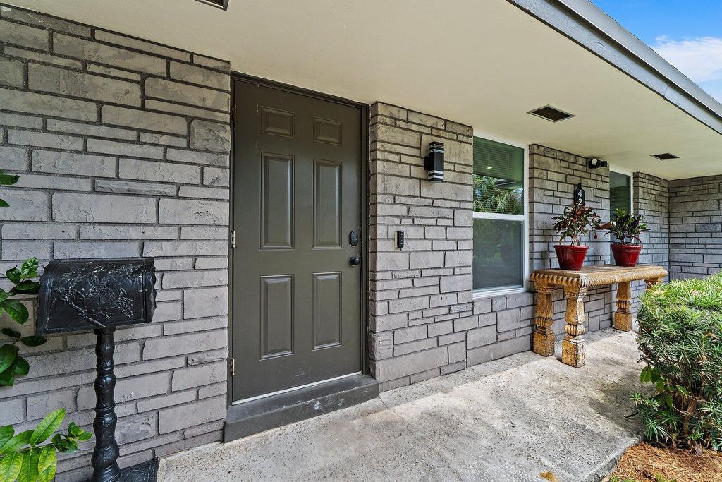 Photo of 425 Greenbriar Drive, Lake Park, FL 33403 (MLS # B26007146)