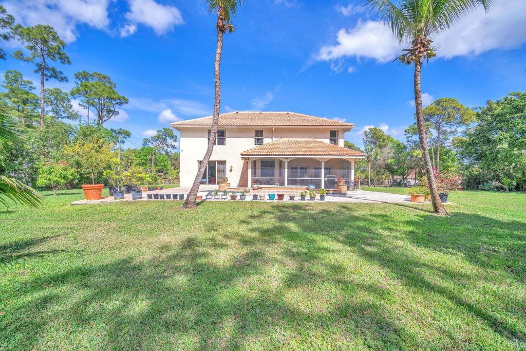 Photo of 17184 75th Place N, The Acreage, FL 33470 (MLS # R11158197)