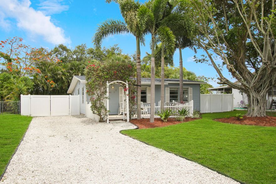 Jupiter Living - No HOA & Fully Furnished! Discover this turn-key 2BR/1BA gem in Eastview Manor. Perfect for boat/RV owners with a spacious side yard and NO restrictive HOA. This home is offered fully furnished—just bring your toothbrush! Features include a sustainable solar system with approx. $30k balance. Buyer may payoff at closing for clear title or explore bundling the balance with their lender. Ideally located within walking distance to Jupiter Elementary & High School, and minutes from Harbourside Place and world-class beaches. Brand new roof (2021). All measurements and solar details are approximate; Buyer/Buyer Agent to verify all info. Don't miss this rare, affordable opportunity in one of Florida's top coastal towns!