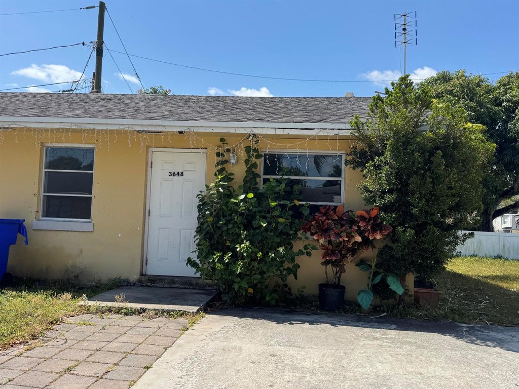 Photo of 3648 Coconut Road, Palm Springs, FL 33461 (MLS # R11082758)