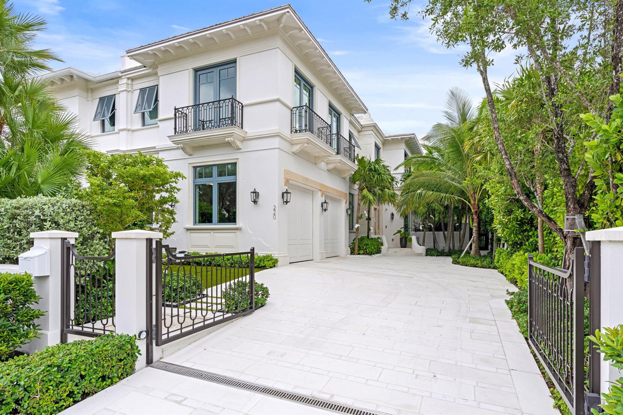 Welcome to this newly built town home located in the center of Palm Beach! Spanning over 5,300 total square feet, this 4-bedroom home features gorgeous finishes such as hardwood and shell-stone limestone flooring and a custom Downsview kitchen with Sub-Zero & Wolf appliances. A stunning floating staircase leads to the second floor which features a large primary suite with dual bathrooms & a large terrace, as well as three guest suites, all with ensuite bathrooms. Outdoors you'll find a spacious covered patio with a built-in summer kitchen, a large swimming pool and spa and a full cabana bathroom. Additionally, this home has an elevator, full house generator, smart system and a large air conditioned 2 car garage.