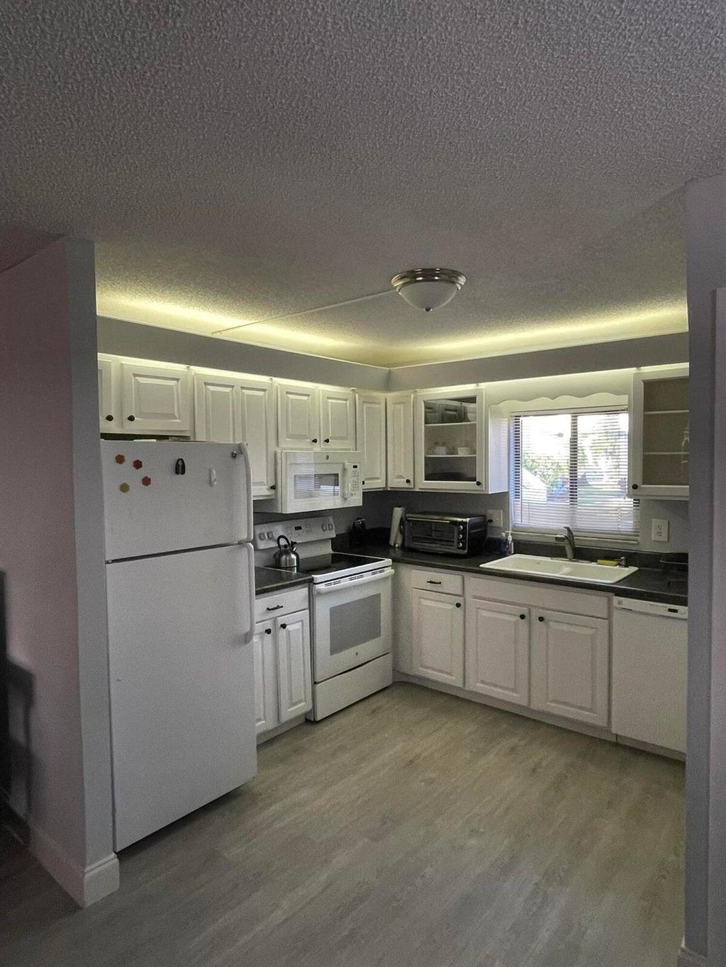 Photo of 1561 NE 12th Terrace #C-4, Jensen Beach, FL 34957 (MLS # R11050503)