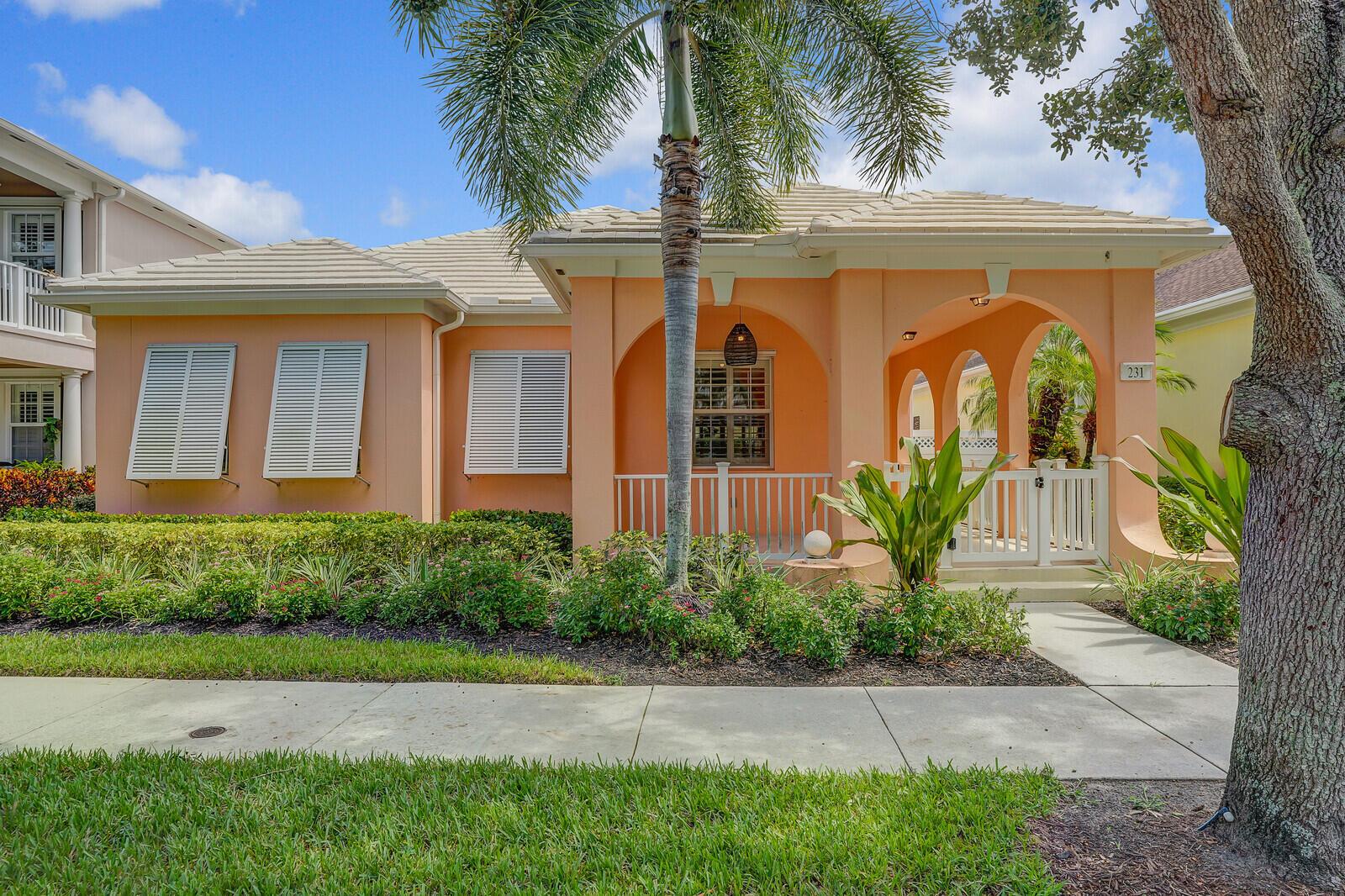 Welcome to Martinique, one of Abacoa's most desirable neighborhoods! This single-story DiVosta home offers 3 bedrooms, 2 baths, and a recently remodeled kitchen with stylish cabinetry, streamlined countertops, and upgraded appliances. Plantation shutters complement the open floor plan, while a modern faux fireplace with color-changing lights and heating options adds a contemporary touch. The primary bath features a new vanity, shower, tile, mirror, and a Bluetooth exhaust fan with speaker. Step outside to a heated pool with waterfall, brick paver deck, turf yard, outdoor shower, and landscape lighting. Recent updates include a 2025 A/C, newer pool heater, and refreshed landscaping. Additional highlights include an extended driveway and a 2-car garage.