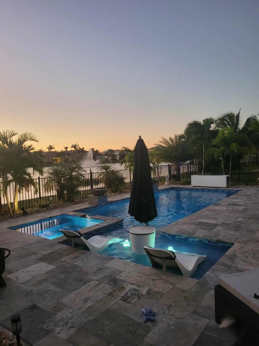 Beautifully Upgraded Lake View Home with Saltwater Pool and Jacuzzi!!
Don't miss your chance to own this stunning 3-bedroom, 2-bath lake view home with a versatile flex room. The kitchen features elegant Monaco quartzite countertops, and tile flooring flows throughout for easy maintenance. Crown molding and chair rails add a touch of elegance to the living spaces.
Enjoy resort-style living in your private backyard oasis! The saltwater pool with integrated jacuzzi and heater overlooks a tranquil lake. The expansive screened-in lanai includes a fully equipped outdoor kitchen with granite countertops—ideal for entertaining. New grass recently installed for a fresh, vibrant look!