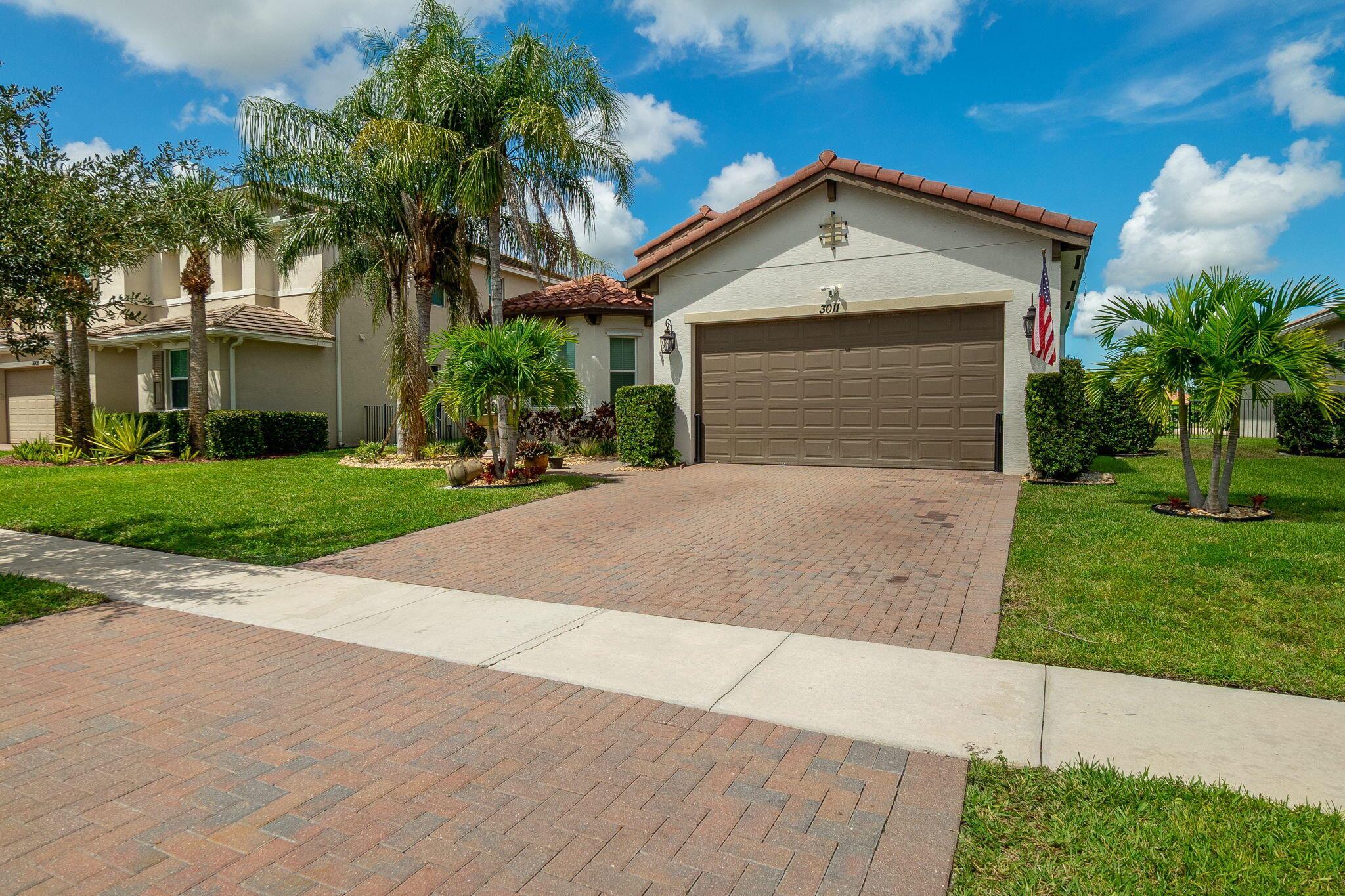 Don't miss the opportunity to buy this stunning 3-bedroom house with a flex room and 2 bathrooms, Den just converted into a third bedroom. Beautiful pool with jacuzzi and a heater, lake view and a huge porch with outdoor kitchen and granite countertop. Perfect for entertainment. Many upgrades. Assumable VA loan at 2.25 interest rate subject to lender and VA approval.