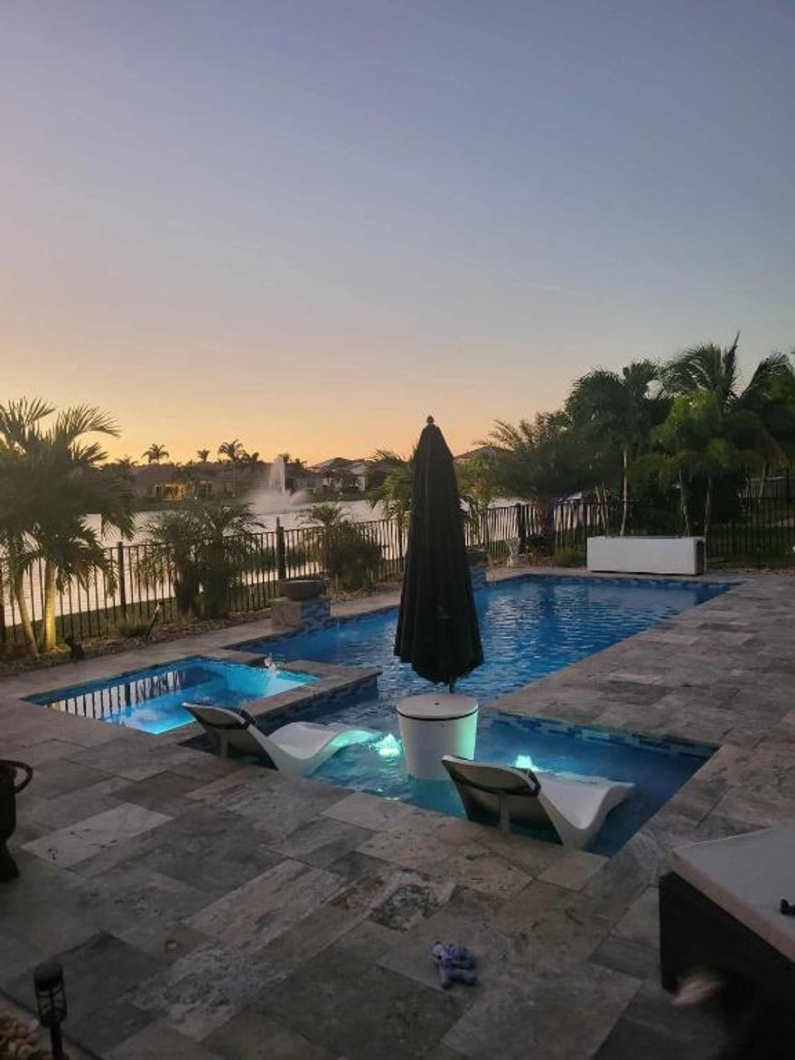 Beautifully Upgraded Lake View Home with Saltwater Pool and Jacuzzi!!
Don't miss your chance to own this stunning 3-bedroom, 2-bath lake view home with a versatile flex room. The kitchen features elegant Monaco quartzite countertops, and tile flooring flows throughout for easy maintenance. Crown molding and chair rails add a touch of elegance to the living spaces.
Enjoy resort-style living in your private backyard oasis! The saltwater pool with integrated jacuzzi and heater overlooks a tranquil lake. The expansive screened-in lanai includes a fully equipped outdoor kitchen with granite countertops—ideal for entertaining. New grass recently installed for a fresh, vibrant look!