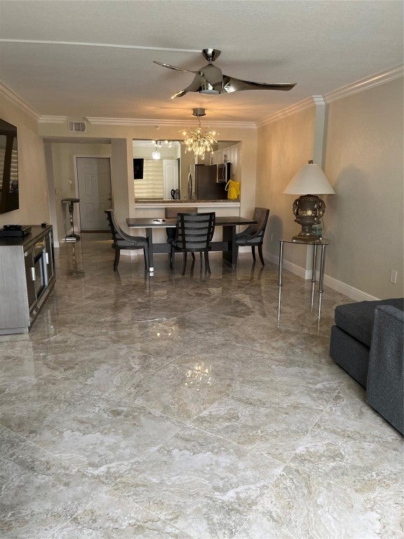 Photo of 9525 Weldon Circle #202, Tamarac, FL 33321 (MLS # F10458021)
