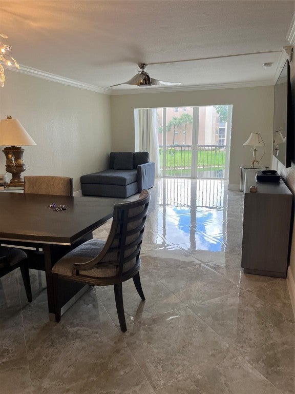 Photo of 9525 Weldon Circle #202, Tamarac, FL 33321 (MLS # F10458021)
