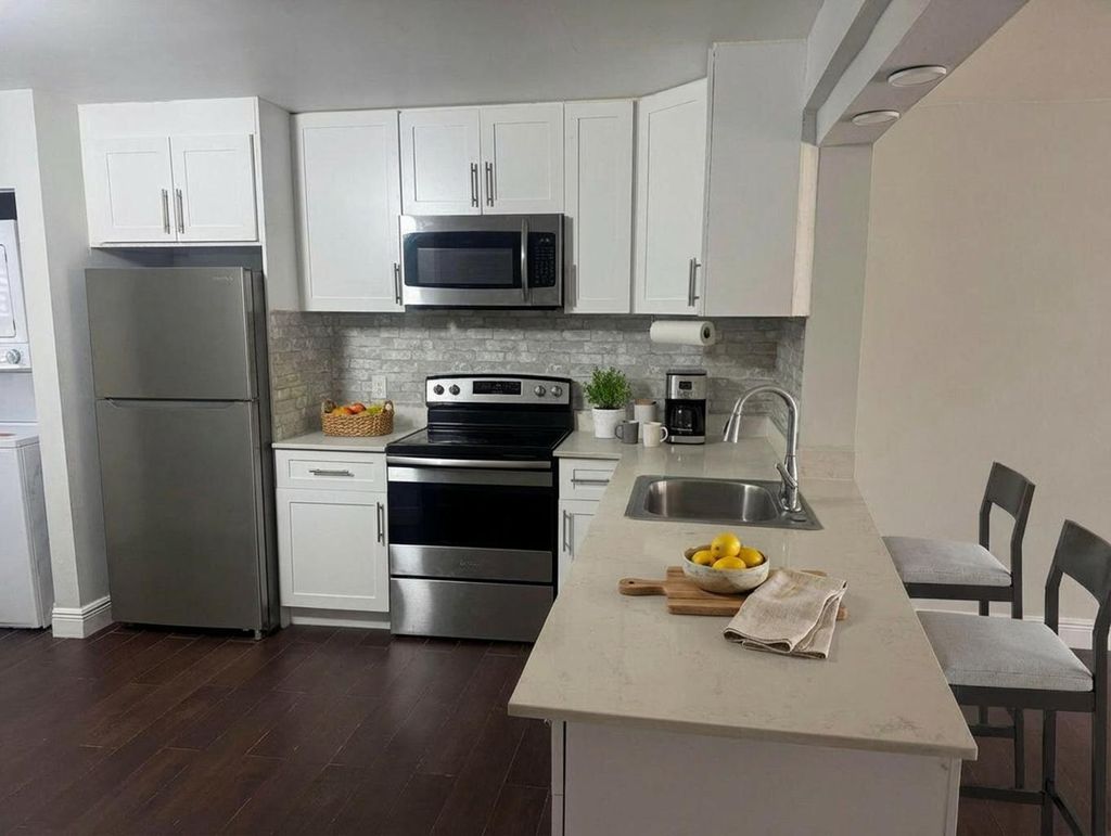 Photo of 4811 Lake Arjaro Drive #4811, West Palm Beach, FL 33407 (MLS # R11163050)